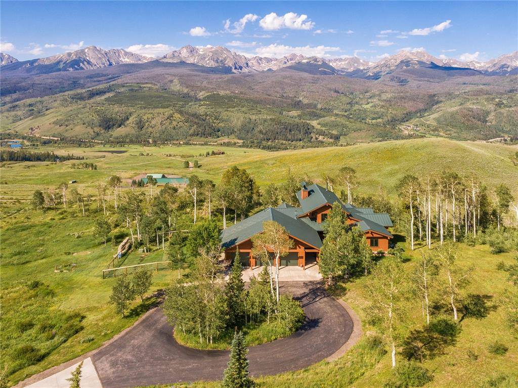 Located at the pinnacle of Pioneer Creek Ranch, this western ranch styled home is ideally located with panoramic views from the Ten Mile Range to the Gore Range.