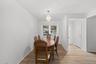 Bright and open dining room with brand new luxury vinyl flooring and freshly painted.