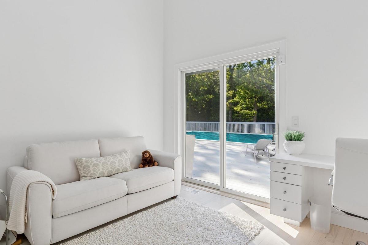 Living room with light wood-type flooring