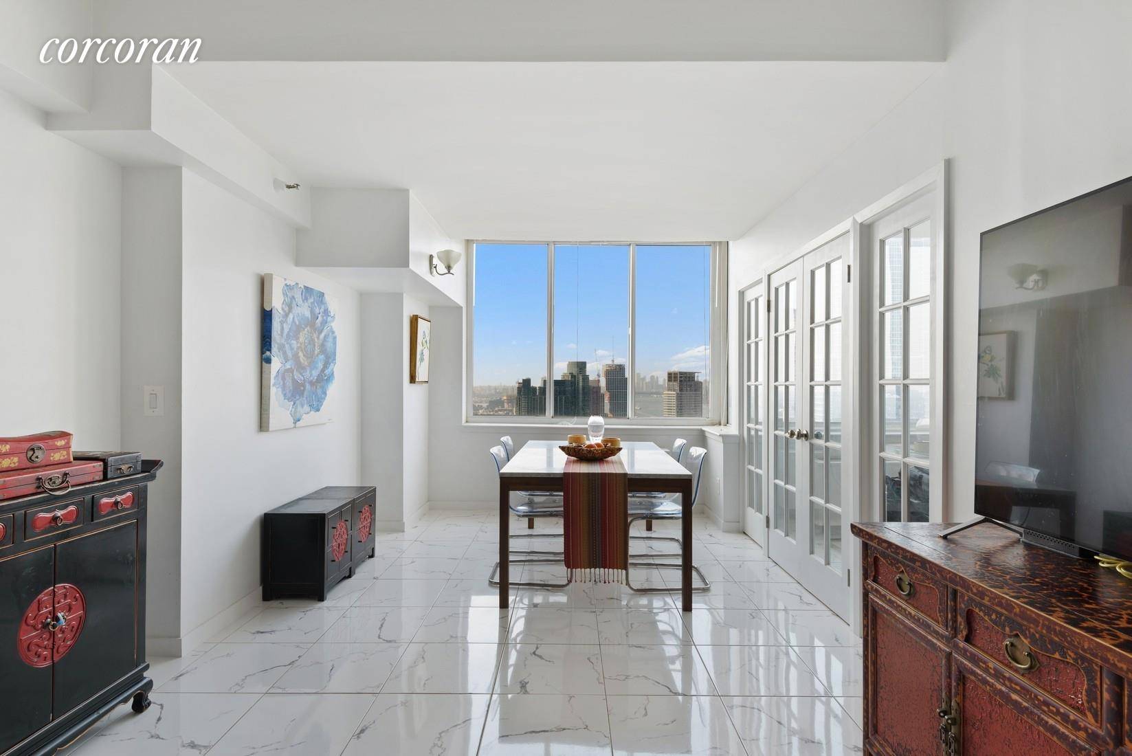 Unit 36H is a large corner one bedroom plus home office layout with 270 degree panoramic western, southern and eastern views of midtown and downtown Manhattan, the East Side River, ...