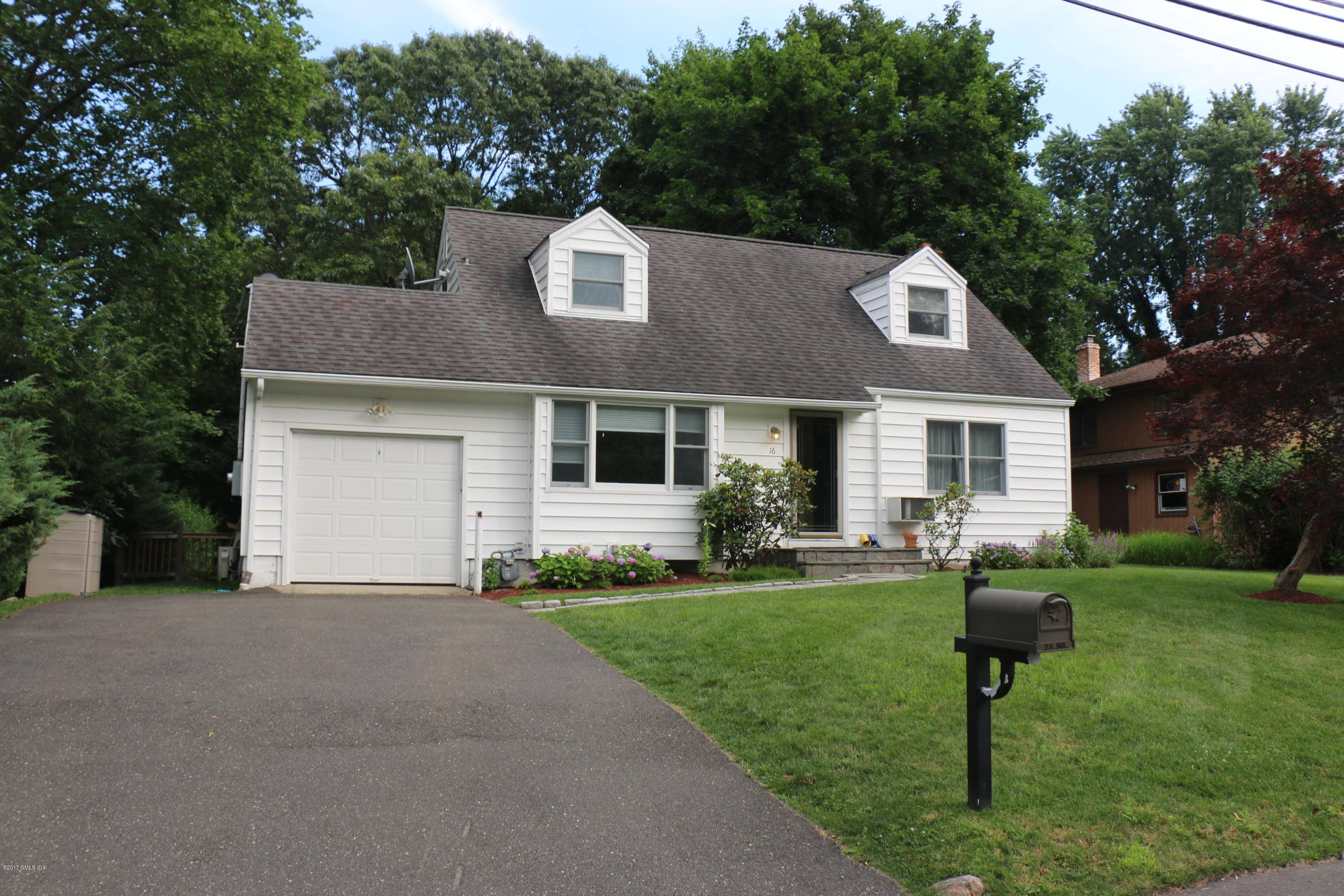 Up dated Cape located on quiet street with convenient access to shopping, schools, and more.