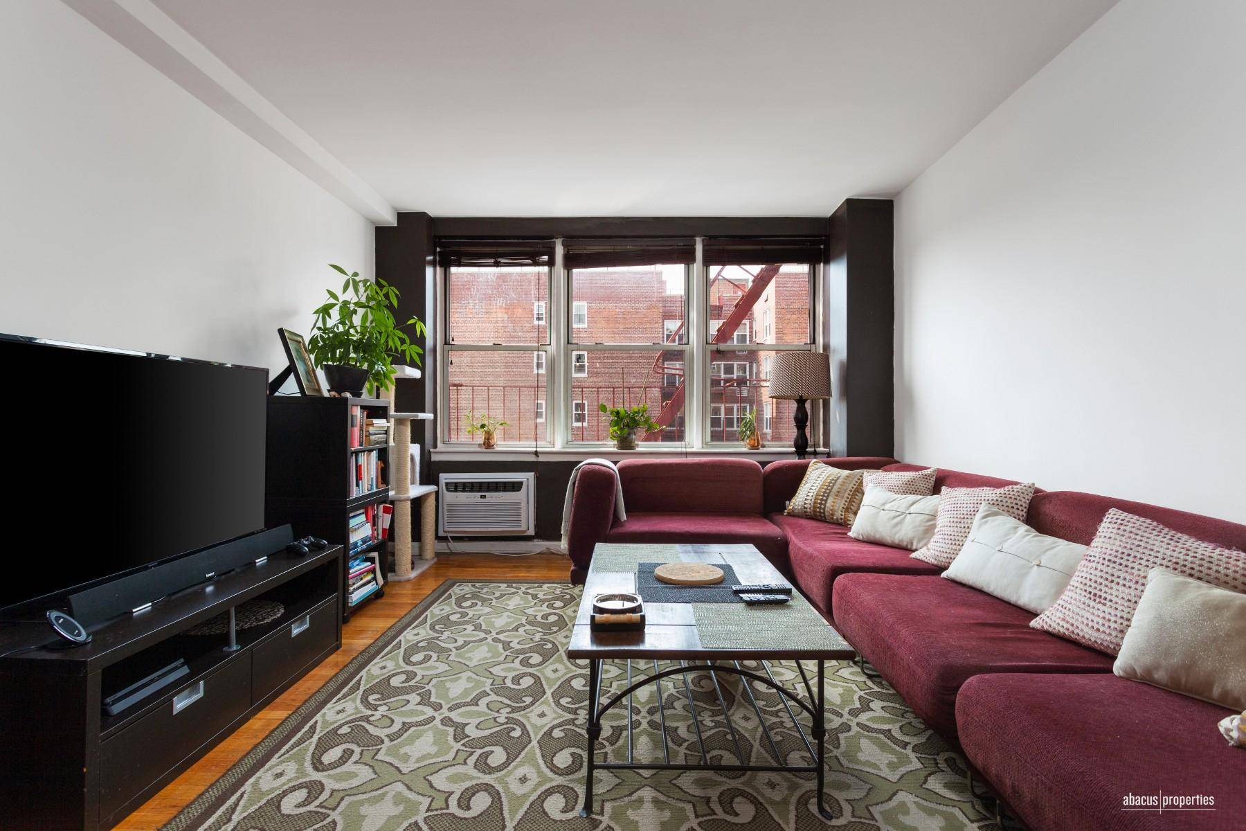 Tired of the ordinary ? Then this corner charmer of an apartment is for you.