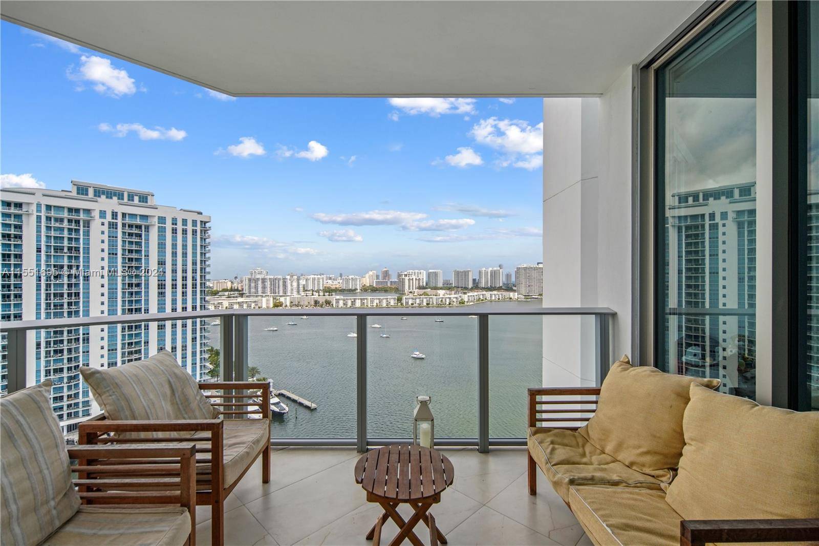 New to market, Reserve at Marina Palms residence 1805 boasting warm finishes with wood millwork, lightly used, 2 bedroom 2.