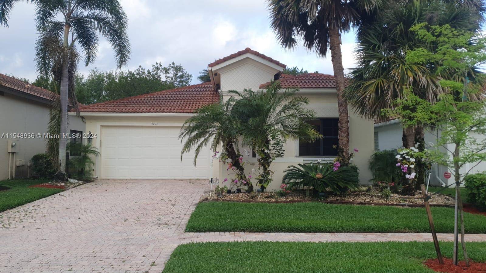 Beautiful house with renovated kitchen, luxurious cabinets and quartz kitchen countertops, A C 2021, all appliances included, new washer and dryer, beautiful gardens with Orchids, very close to beautiful beaches ...