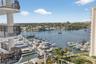 Actual balcony. New plank wood look tile flooring. Expansive balcony w/ room for dining, lounge seating and electric grill. With gorgeous water views.