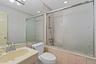 Full bath with tiled shower / bath combo, vanity, and recessed lighting