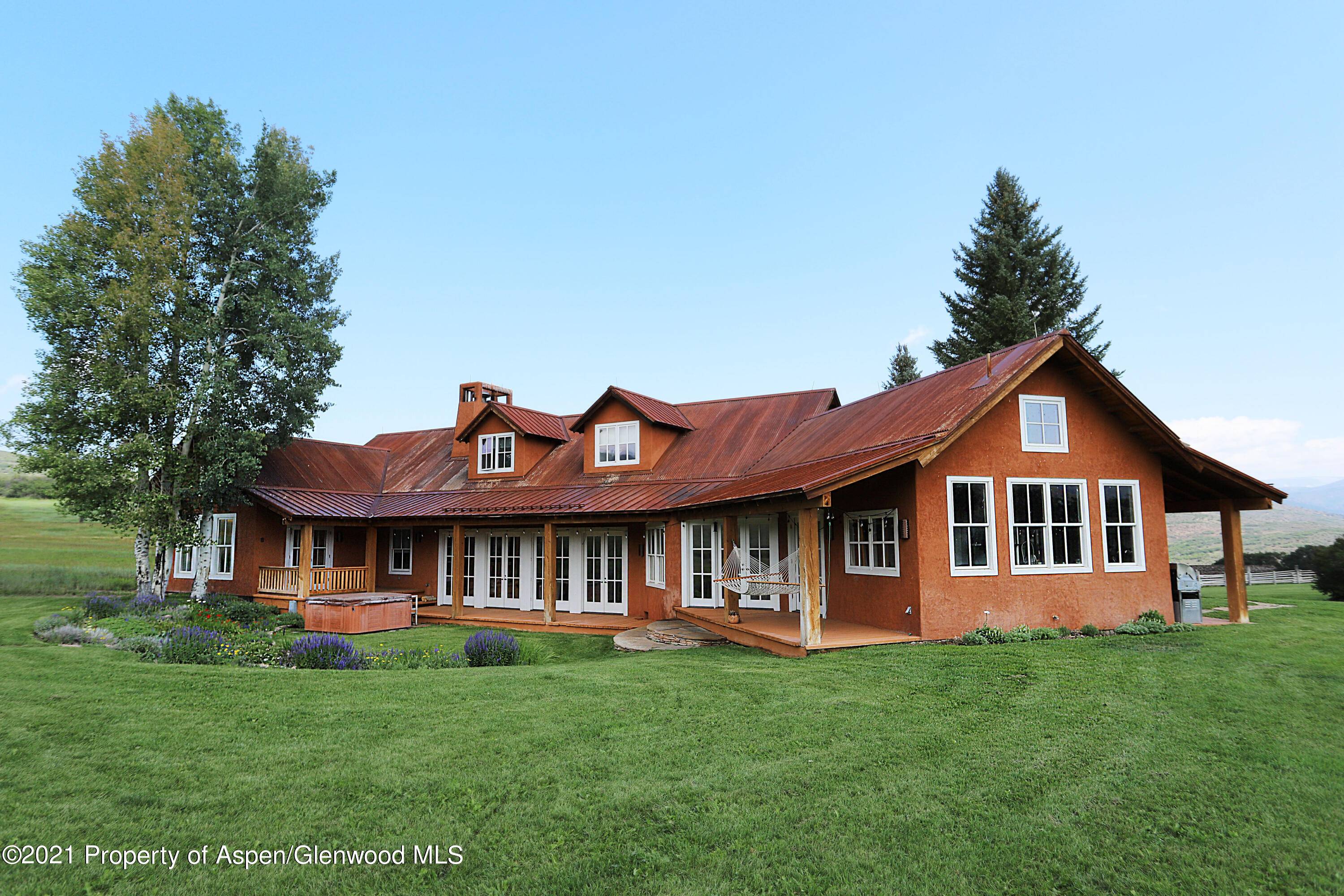 This Ralph Lauren inspired ranch home is perfectly situated on 35 acres within a private ranch in Old Snowmass.