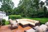 Deck with outdoor lounge area and a lawn
