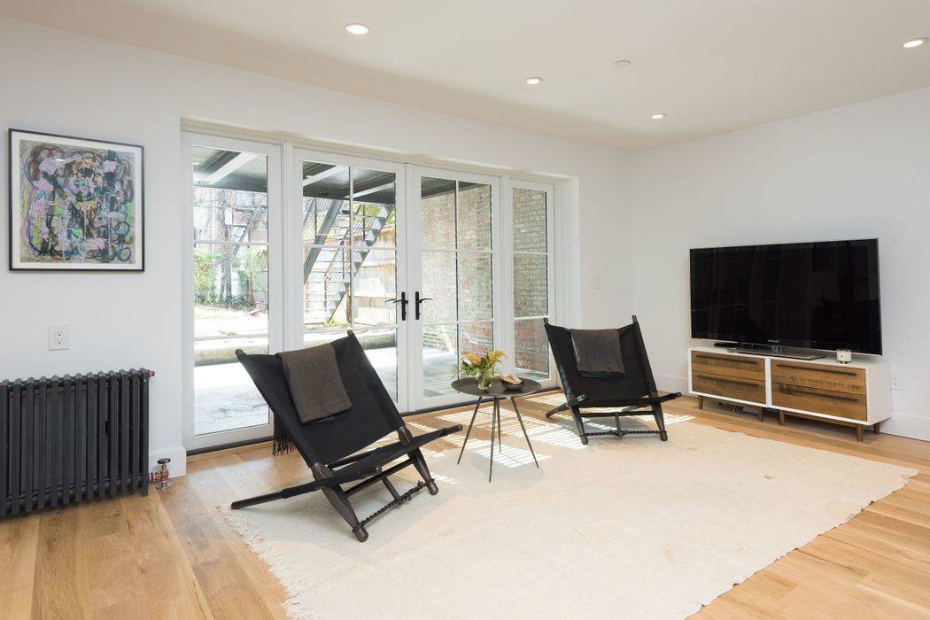 Masterfully renovated by a renowned interior designer, this 2 bedroom, 1 bath Cobble Hill home includes private access to a lush garden through beautiful French doors, flooding the space in ...