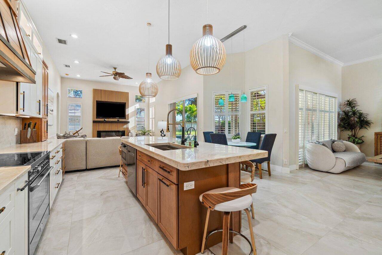 Immerse yourself in luxury living at this stunning turnkey estate home in the heart of Wellington, Florida.