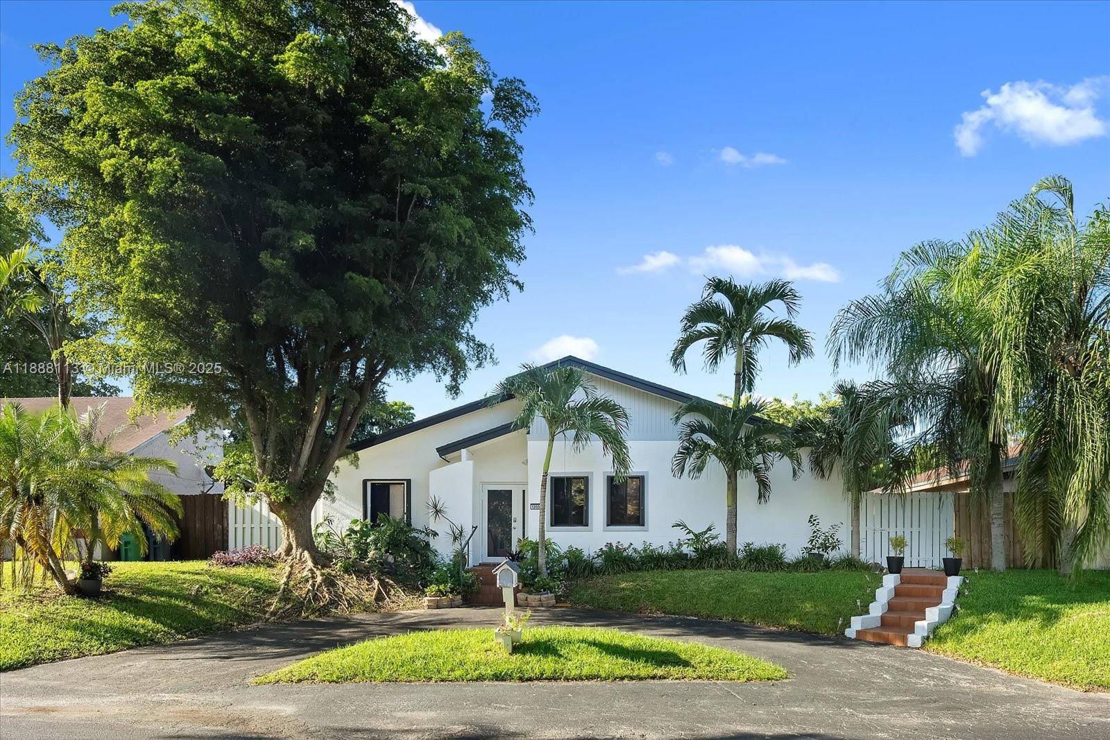 RENOVATED 4 BEDROOM HOME with ATTACHED STUDIO IN LAW QUARTERS.