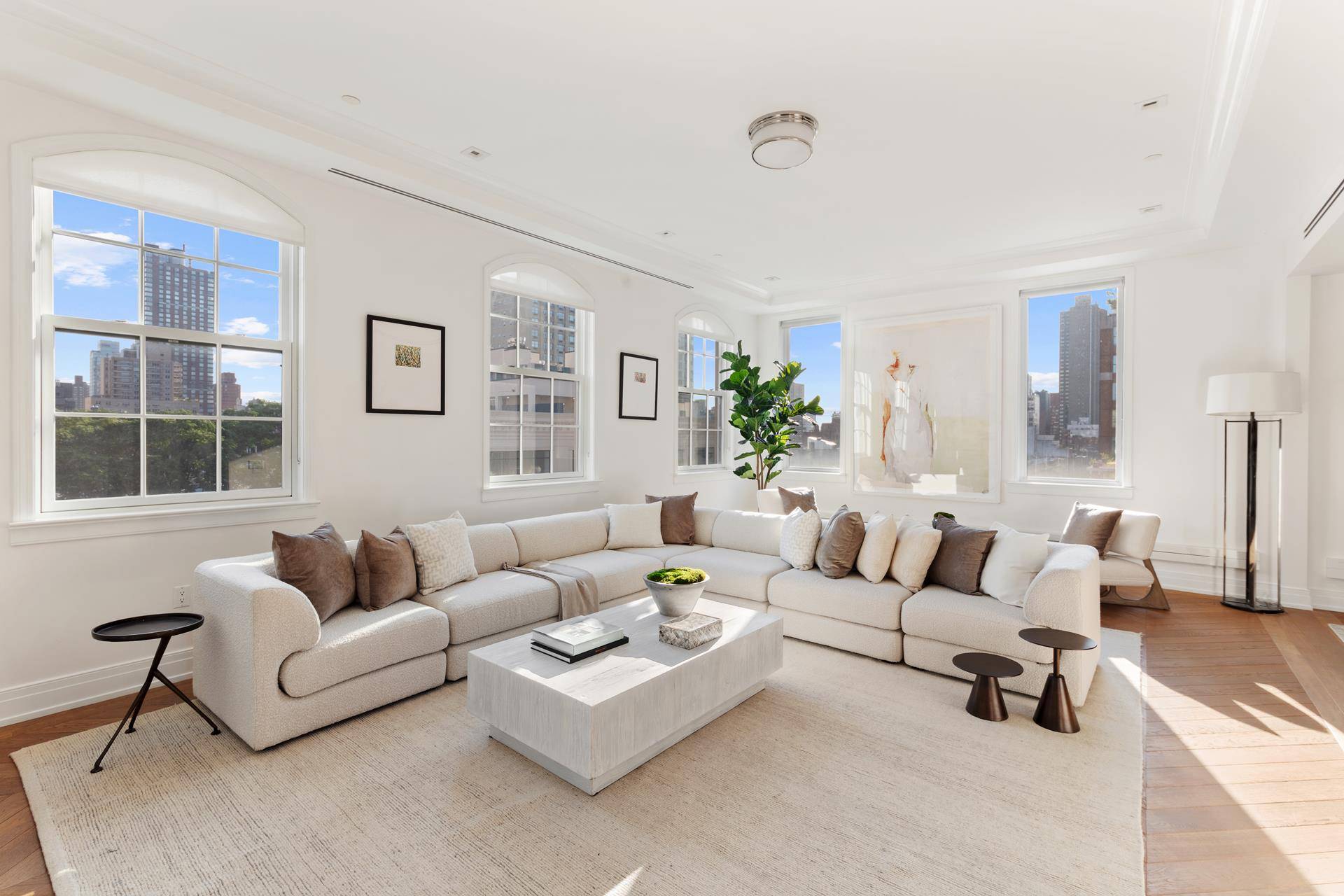 Welcome to this stunning triplex apartment located in a small boutique condo building in the Upper East Side, on a tranquil tree lined street.