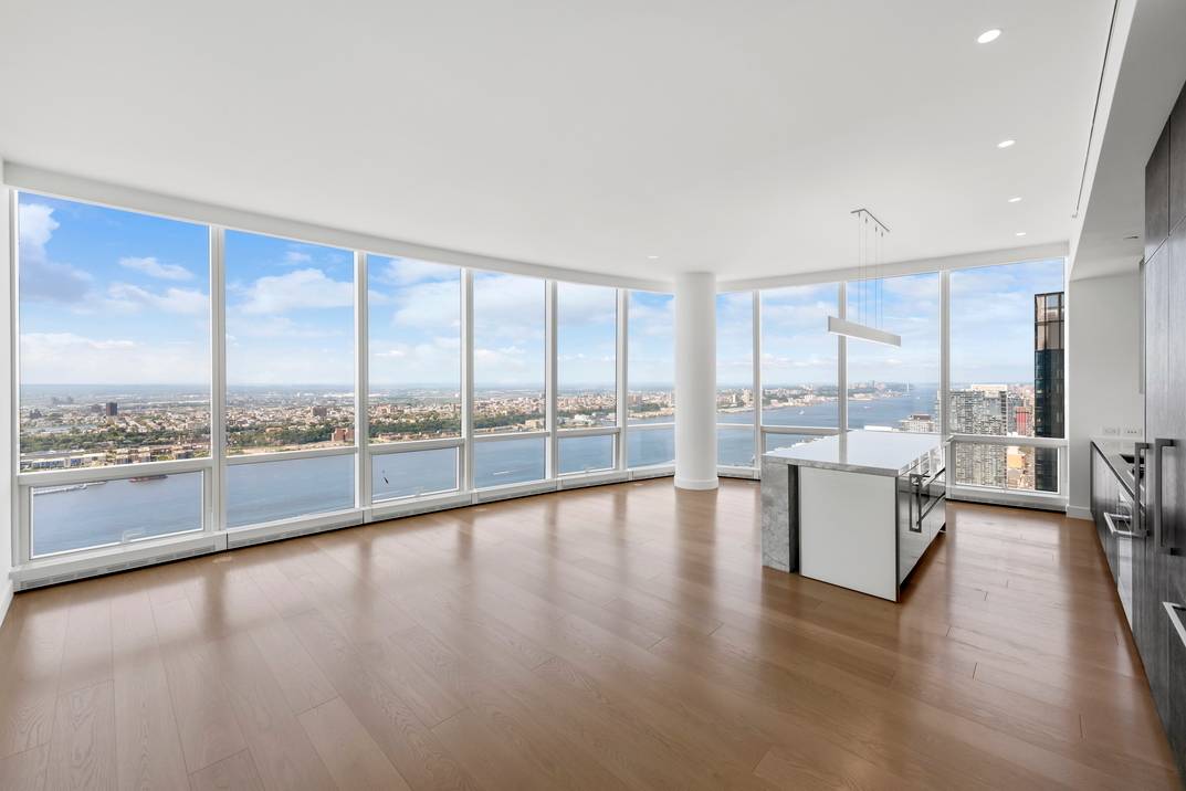 This luxurious two bedroom home features nearly 11 foot ceiling heights and floor to ceiling windows with spectacular views of the Hudson River.