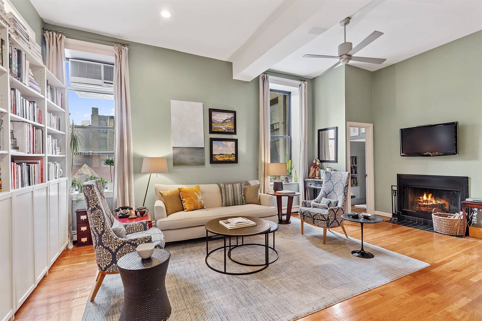 With three bedrooms, 12' soaring ceilings, a WOODBURNING FIREPLACE, exposed brick, and a renovated kitchen and bath, apartment 2C at 157 Waverly has remarkable proportions and a loft like feel ...