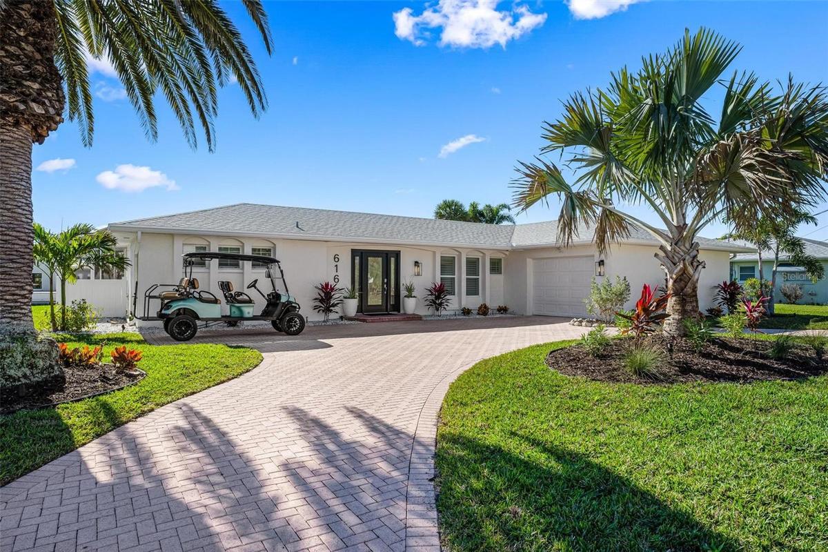 Front elevation with circular driveway