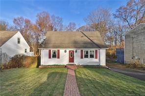 Very well maintained Cape home on Wolcott Line, close to Chestnut Hill Reservoir.
