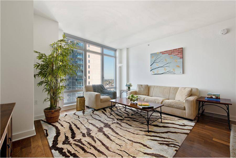VIRTUAL TOURS ONLY 24N is a massive 1, 396 SF home featuring floor to ceiling windows and beautiful views of the Manhattan skyline and the Ease River.