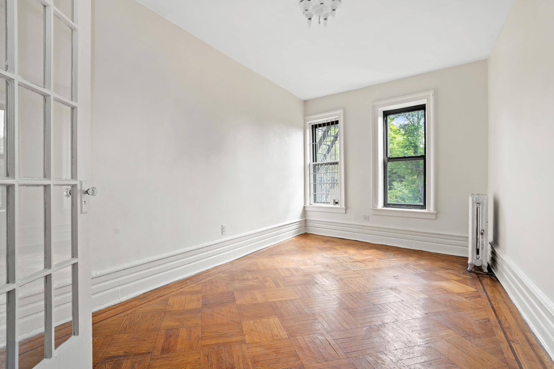 Residence 12 is a spacious, prewar, Prospect Park facing home, with oak coffered ceilings and moldings.