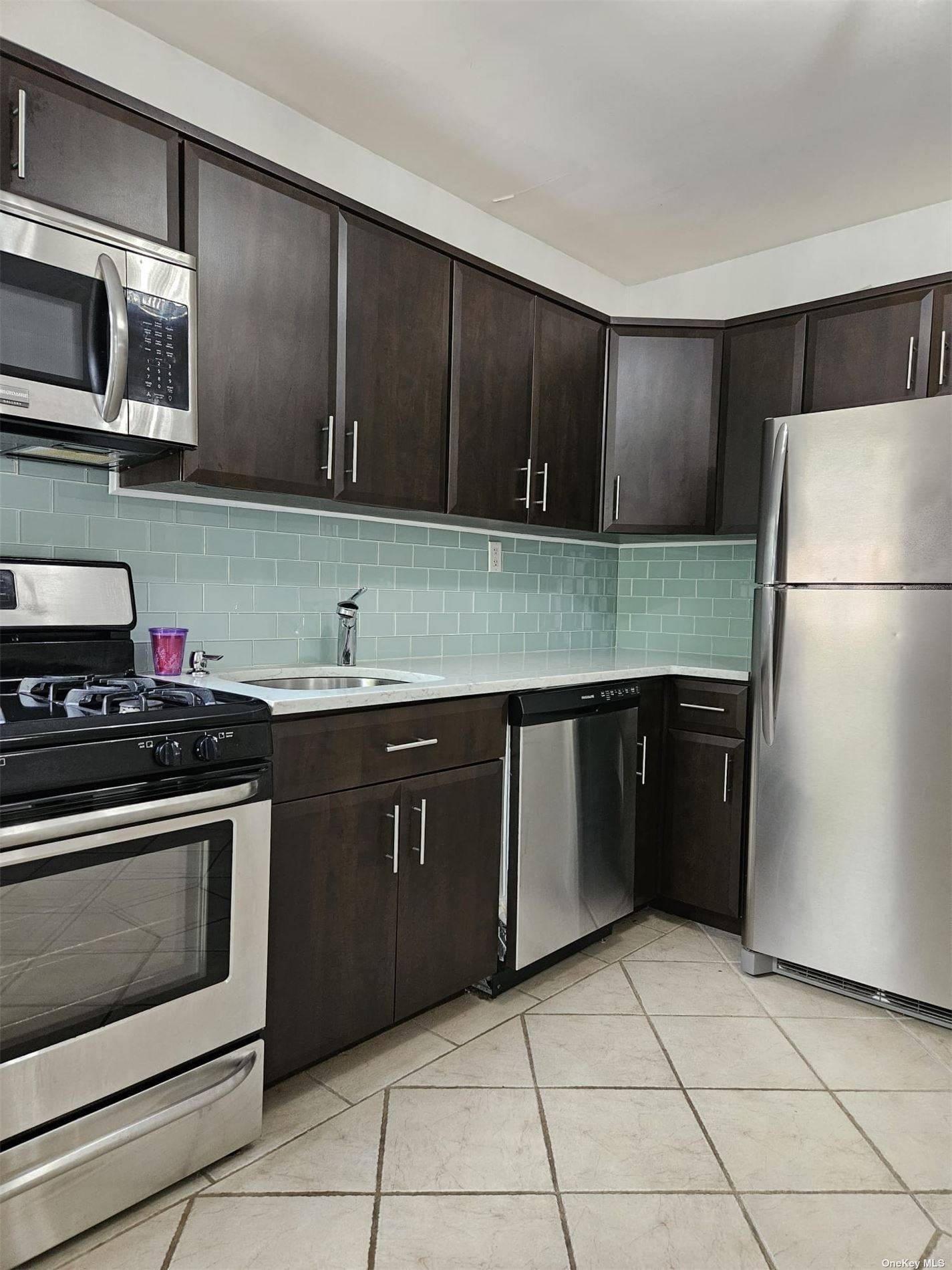 Beautiful and Bright 2 Bedroom Apartment Set Up Open concept kitchen to the living room Kitchen is equipped with stainless steel appliances, dishwasher, ample cabinet space and two large windows ...