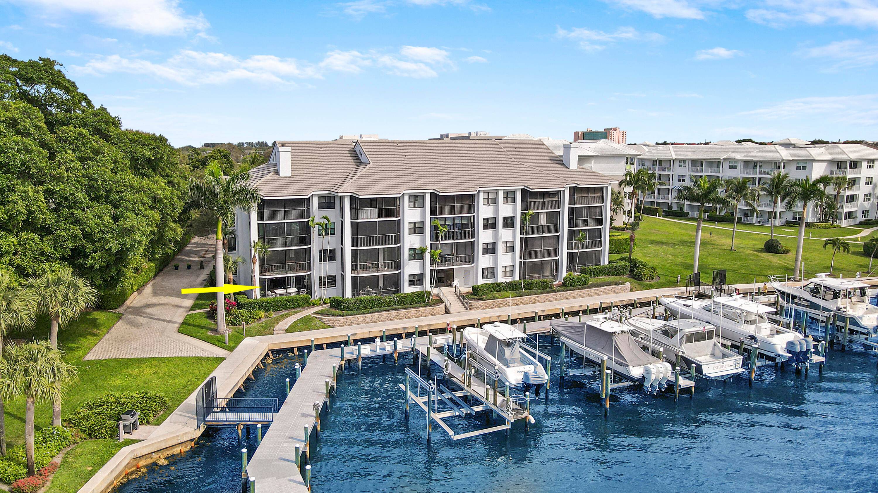 Rarely available, fully renovated 3 bed 2 bath end unit in Bay Colony with unobstructed intracoastal marina views !