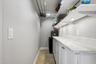 Custom Pantry with Fishing Rod Storage and Room for Tools
