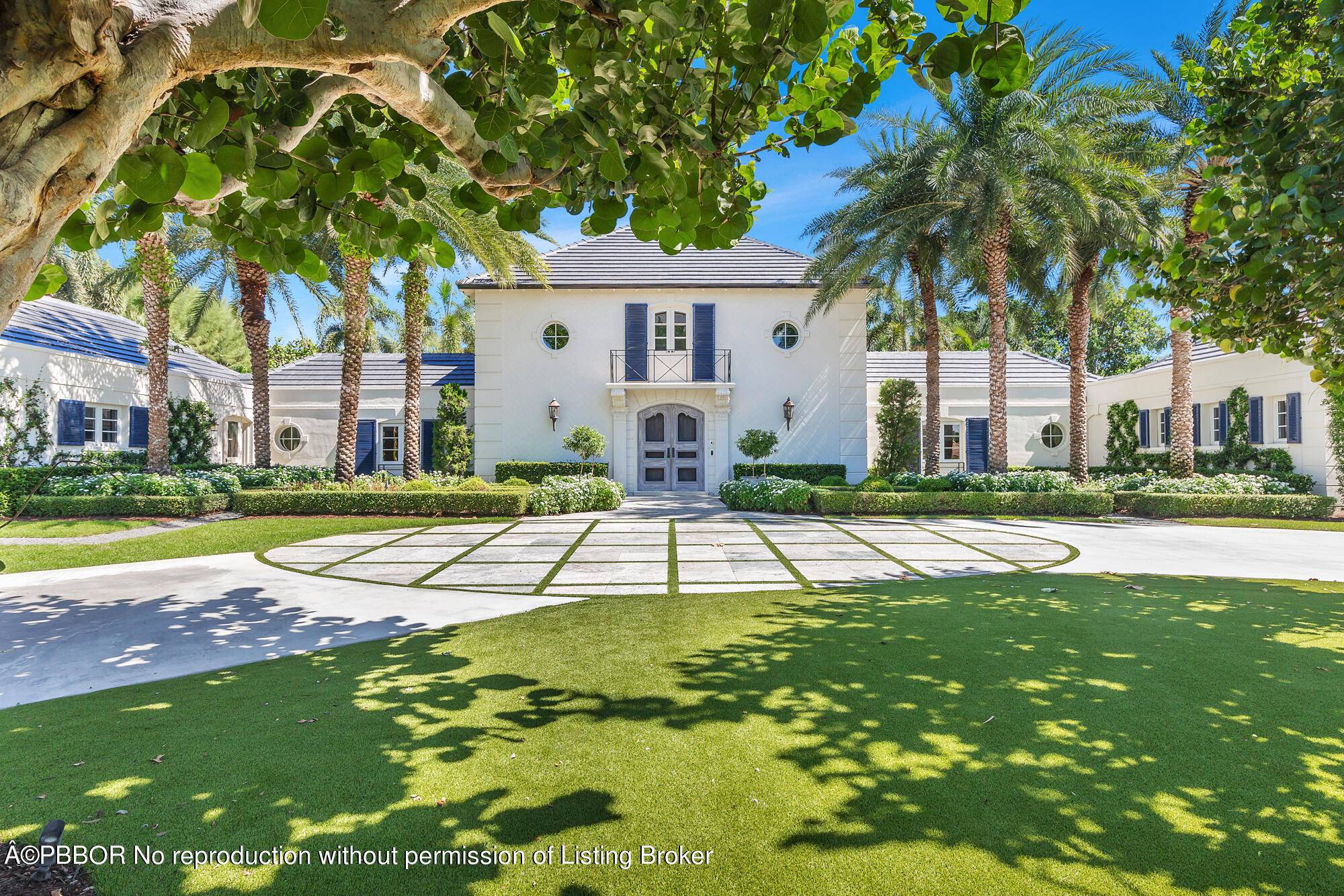 Exquisitely renovated traditional estate on almost a full acre in the heart of Gulf Stream.