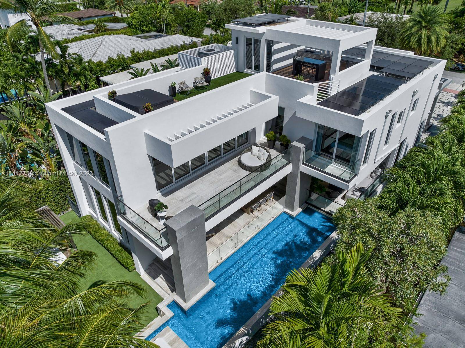Step Inside With Me ! Presenting a modern waterfront custom home in Miami Beach s guard gated Normandy Isle.