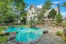 Resort-style living awaits at this spectacular, freshly renovated Tudor with an expansive, recently updated saltwater pool in the heart of the Edgemon