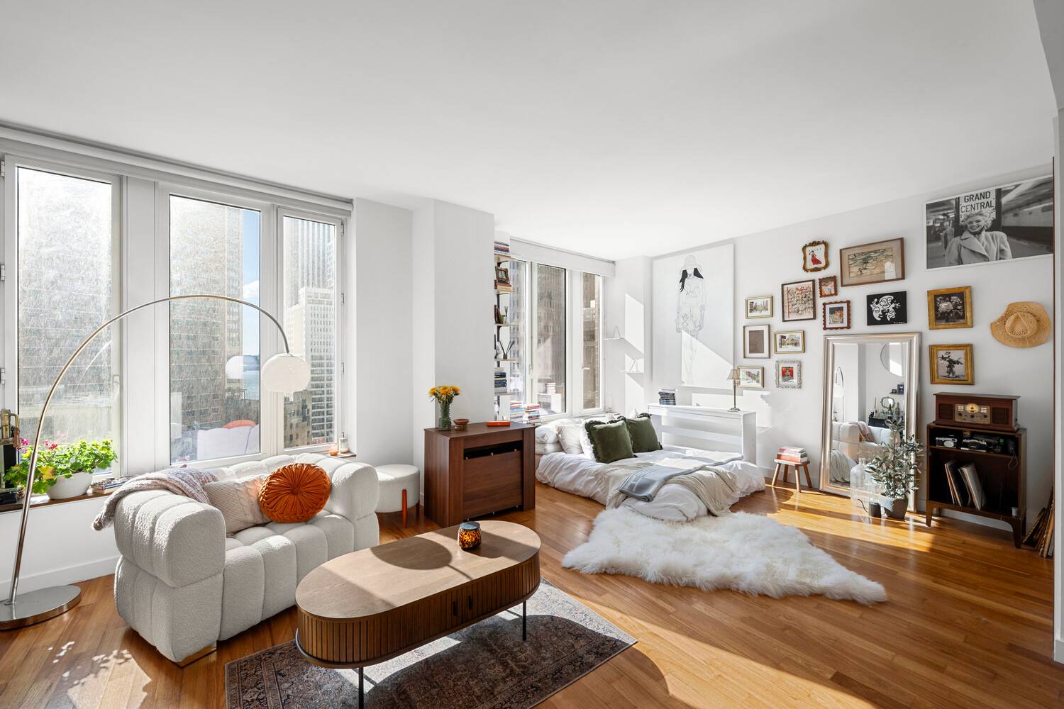 Bathed in light and beautifully proportioned, Residence 18D at 15 William Street is a spacious 698 sq ft studio framed by oversized windows with sweeping open views of the river ...