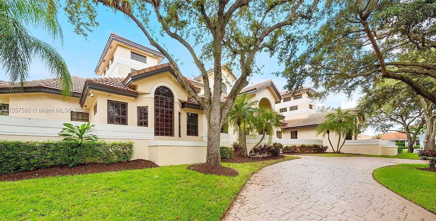 FOR SALE Located within the 24 hour guard gated golf community of Eagle Trace on a half acre corner lot this is one of the largest homes in this private ...