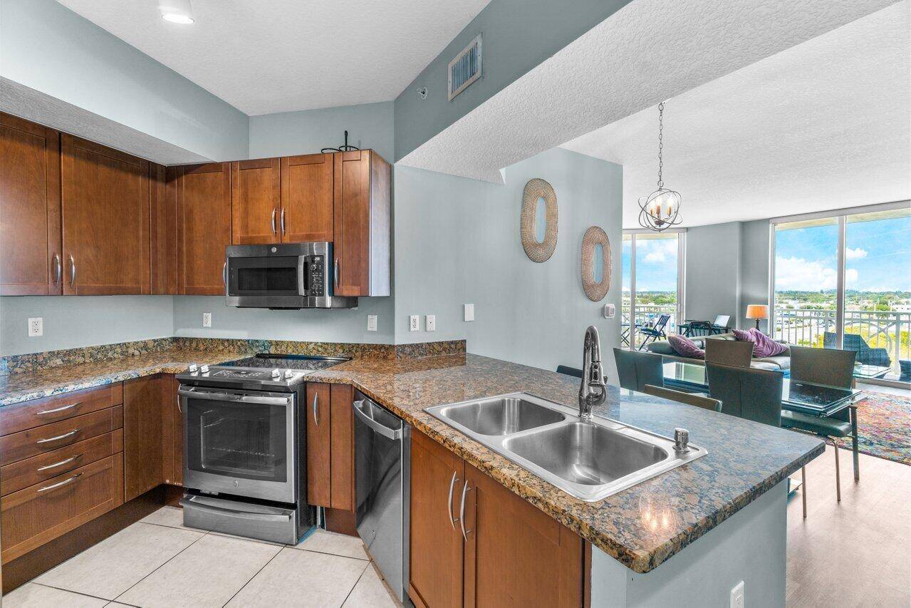 Own this fabulous bright 2 bedroom, 2 bathroom, stylish living condo, less than 1 mile to the beach !