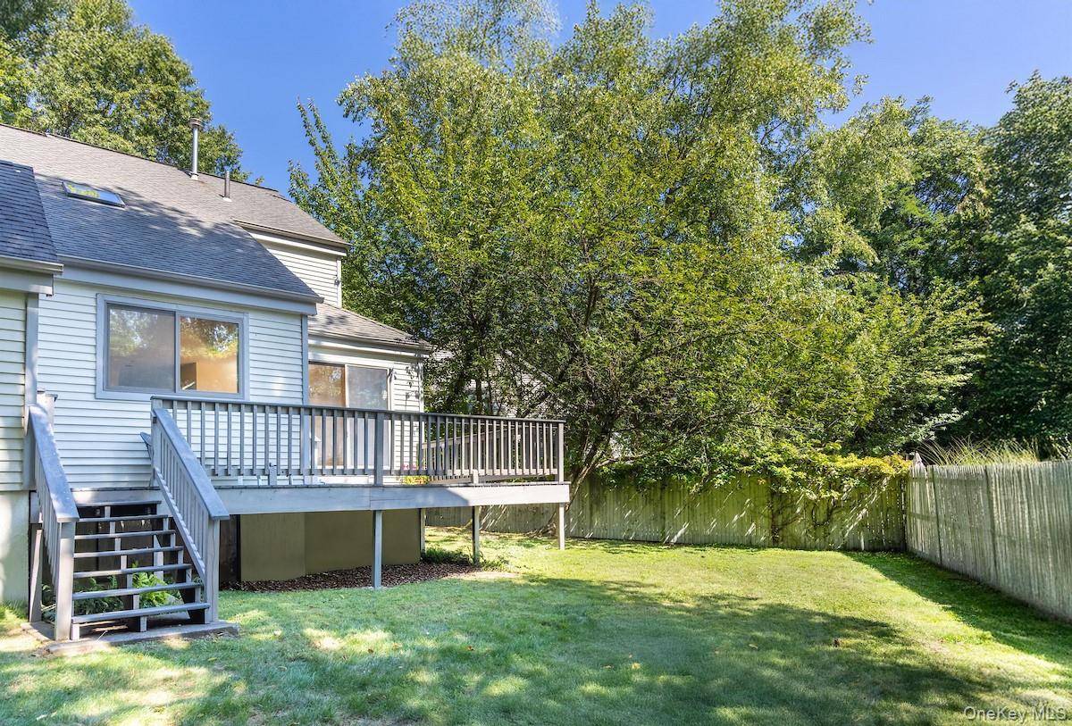 Prized for its unique location, this corner townhome is placed undeniably among the very best settings within Dobbs Ferry's sought after 20 acre community, Hunters Run !