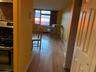 Corridor featuring hardwood / wood-style floors