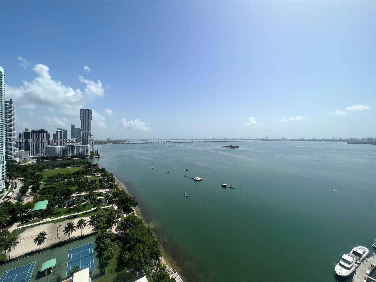 Spectacular bay view, completely furnished unit, 2 bedroom plus den, two full baths.