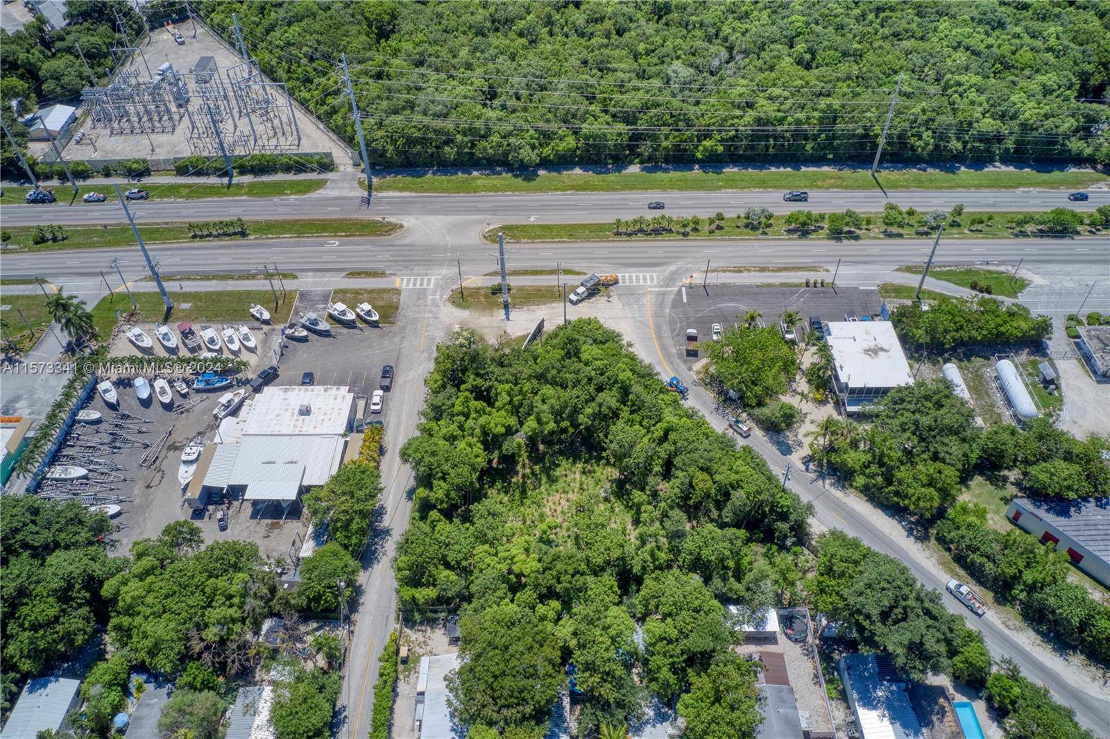 Over a half acre, zoned commercial, vacant lot, located directly on US 1 south.