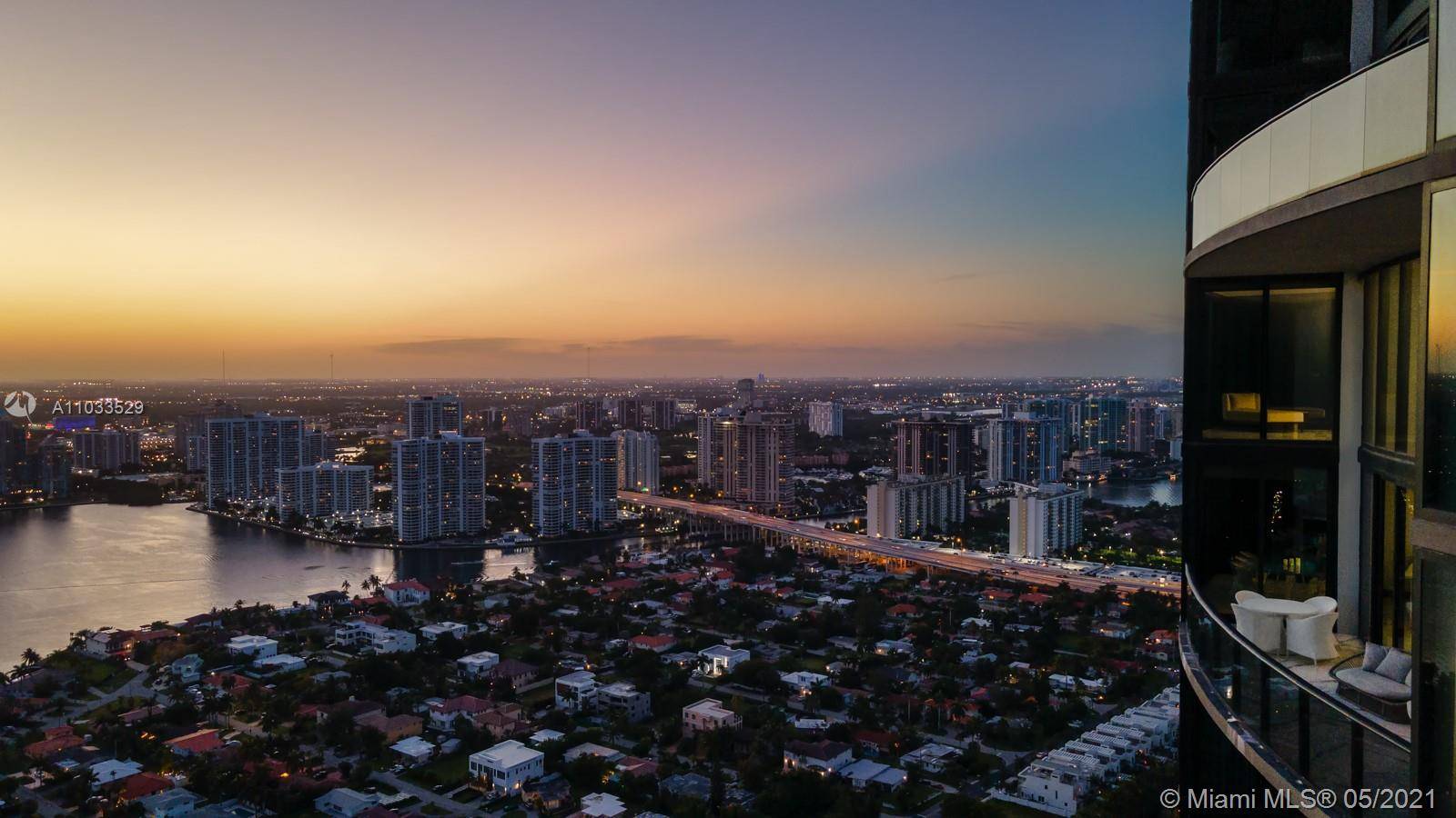 Gorgeous two story apartment at the exclusive Porsche Design Tower with beautiful sunset, intracoastal and city views.