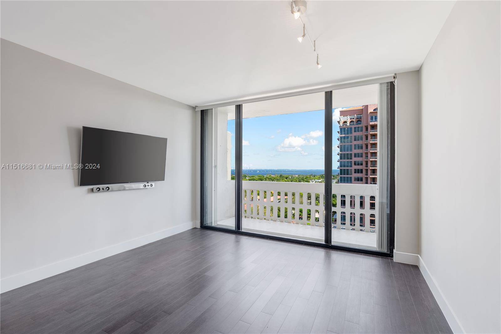 Beautifully renovated Penthouse with massive balcony and endless water views.