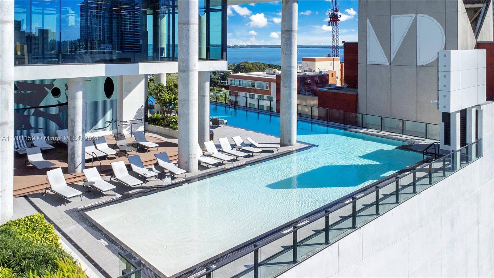 iscover luxurious living in the heart of Miami, a fully furnished residence offering breathtaking views of Biscayne Bay and the Miami skyline.