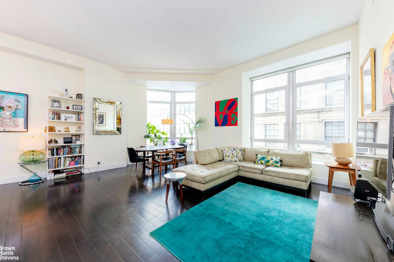 Soaring ceilings and expansive spaces define this modern, loft like corner 2 bed, 2 bath home.