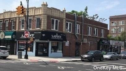 Great investment 5 units, 3 store fronts, 2 two bedroom apartments on Grand Avenue in the heart of Maspeth.