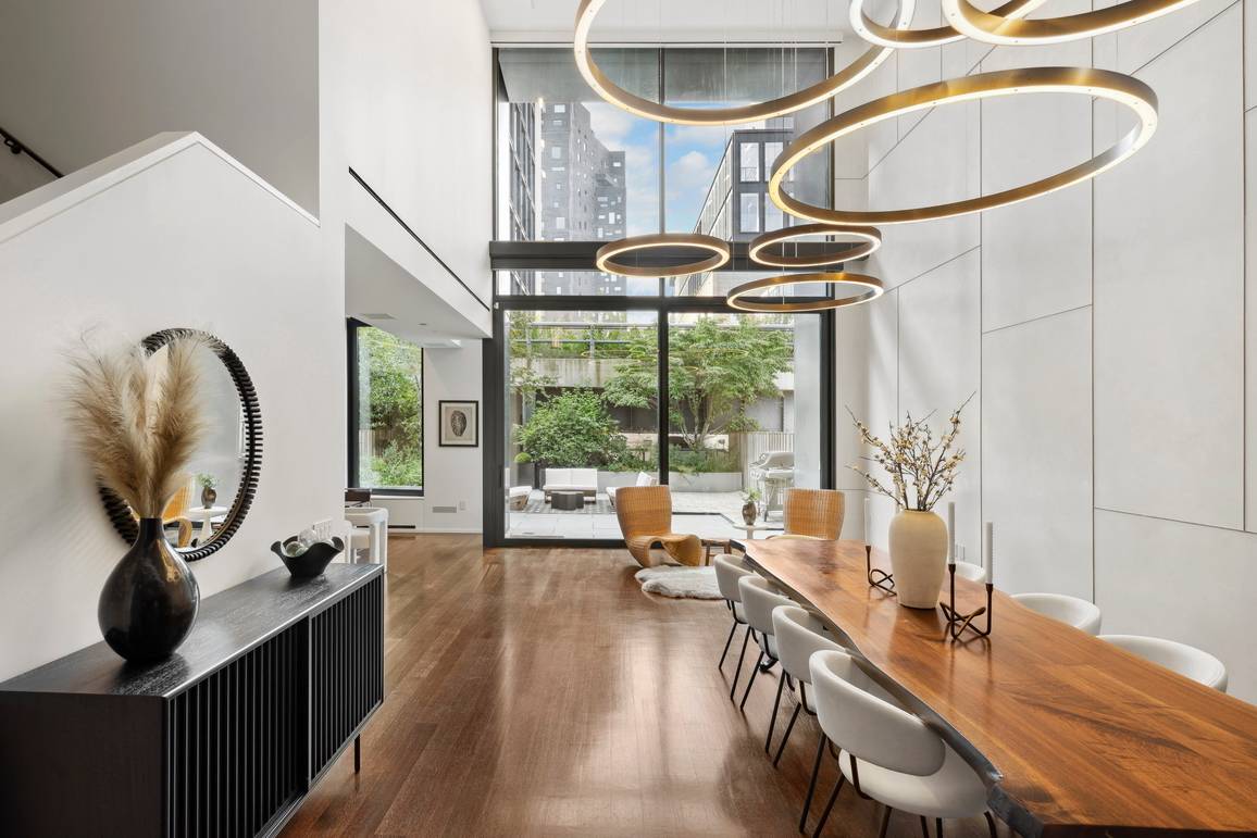 505 West 19th Street, 2D A flawless and stunning modern 3 bedroom, 3 and a half bathroom duplex boasting 22' ceilings, a private terrace, private storage and a plethora of ...