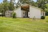 Additional exterior view highlighting the barn