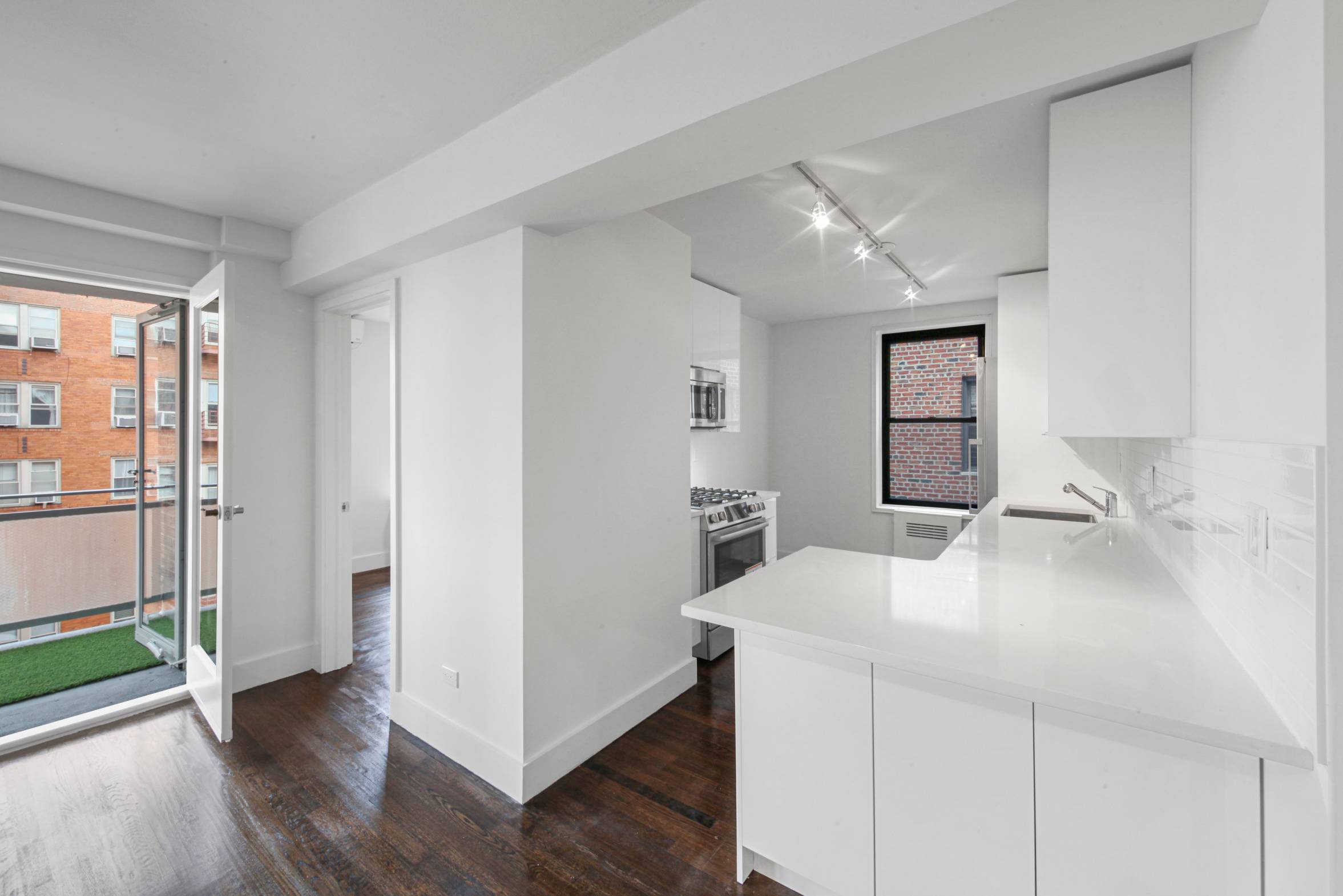Classic and modern blissfully unite for this redesigned and magnificently renovated two bedroom, two bathroom with private balcony.