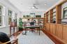 Bespoke floor-to-ceiling built-ins in the Office/Library offer both a striking visual statement & unparalleled storage