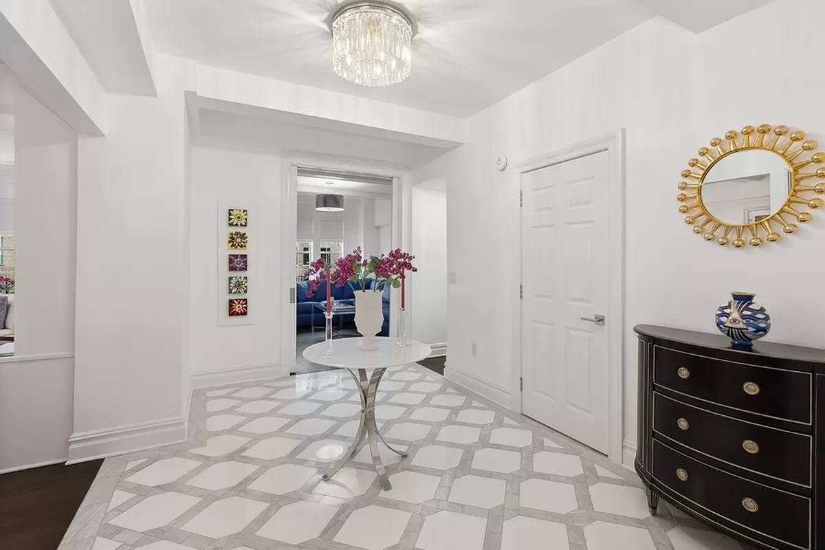 Gut Renovated Pre War Luxury w Fireplace and Quadruple ExposureClassic New York City glamor meets modern elegance in this sun splashed corner condo in a regal pre war building whose ...