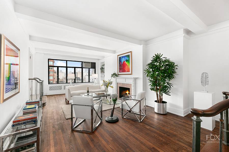 A regal high floor six room apartment now five with sunny open city views is newly available in this prestigious, architecturally interesting prewar cooperative building.