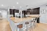KITCHEN WITH LARGE ISLAND & BREAKFAST BAR