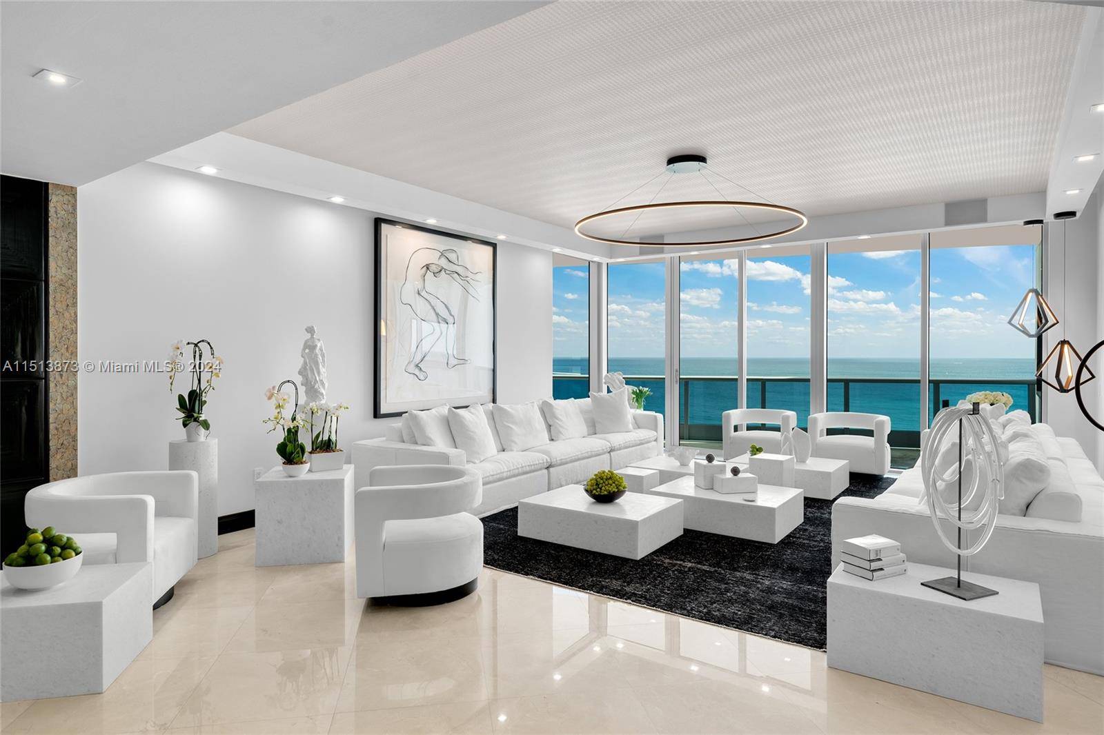 Located at the exclusive Bath Club, this immaculately designed oceanfront unit exemplifies luxury living w meticulous attention to every design detail.