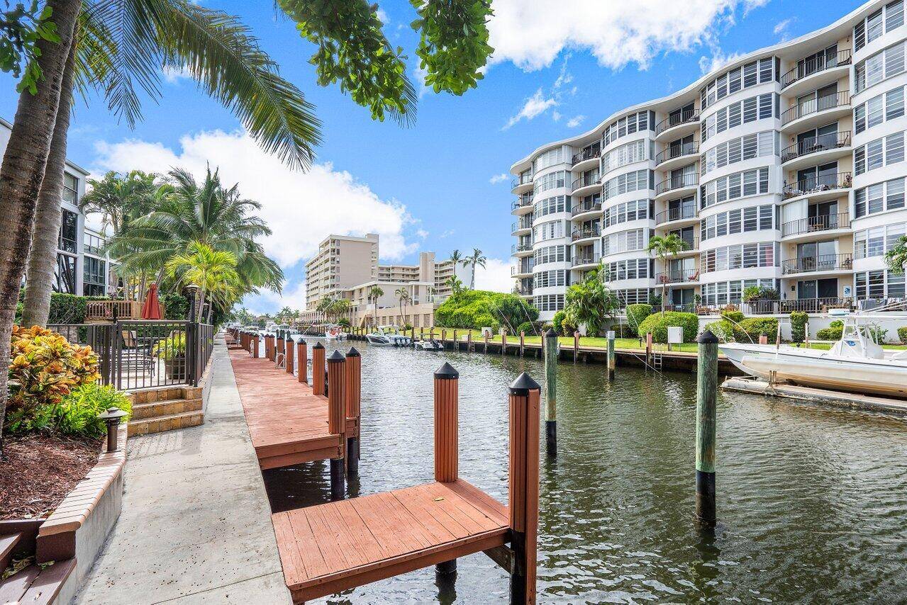 Direct waterfront, beautifully upgraded townhome with assigned boat dock located east of Federal Highway in the prestigious neighborhood of Coral Ridge.