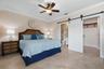 Primary bedroom with large walk in closet and ensuite bathroom